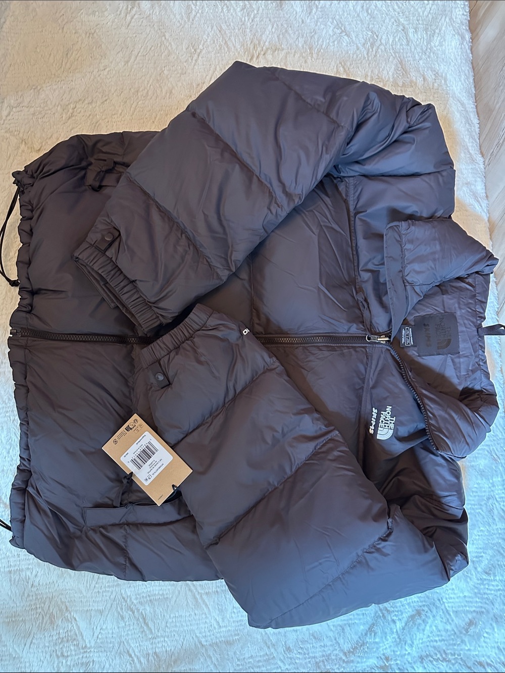 The North Face x SKIMS 700 Down Puffer Coat in Phoenix color